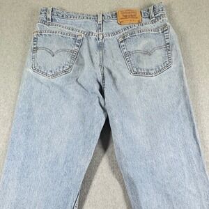 Vintage Levi's 550 Relaxed Fit Jeans Mens 36x29 Light Wash Distressed USA 90s